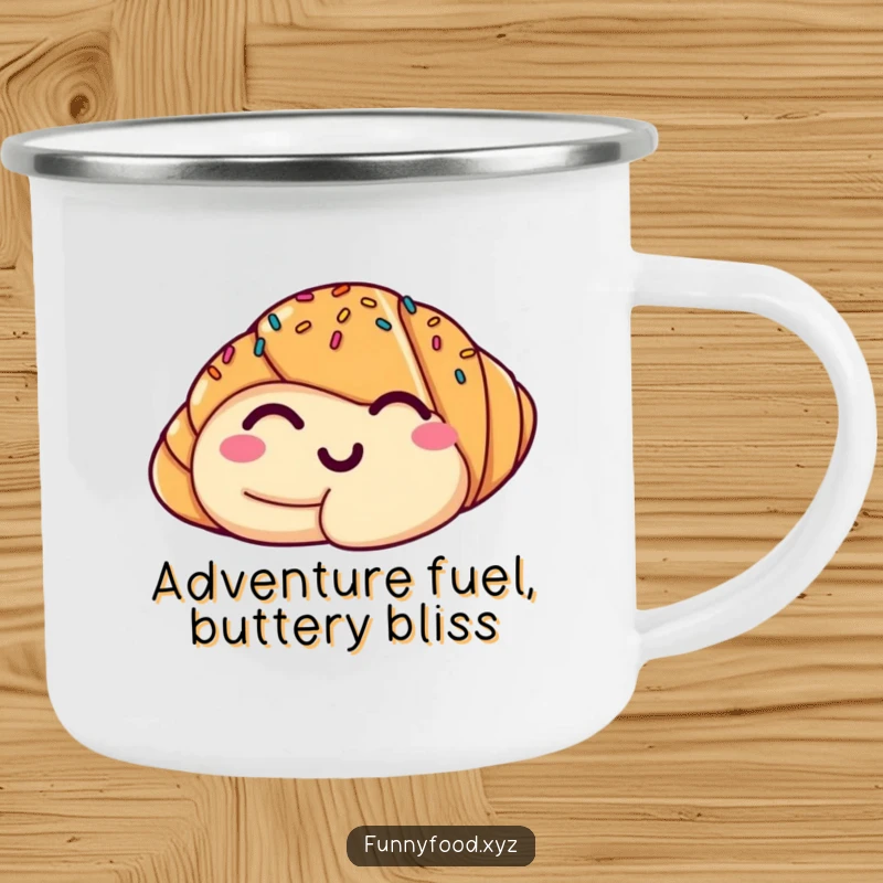Funny camping mug featuring a winking croissant, perfect for enjoying drinks outdoors with a smile.