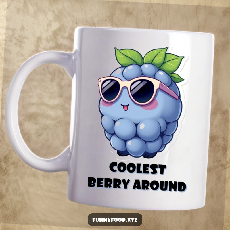 Funny Mug featuring a charming blueberry wearing tiny sunglasses, looking effortlessly cool and stylish on a sunny day.