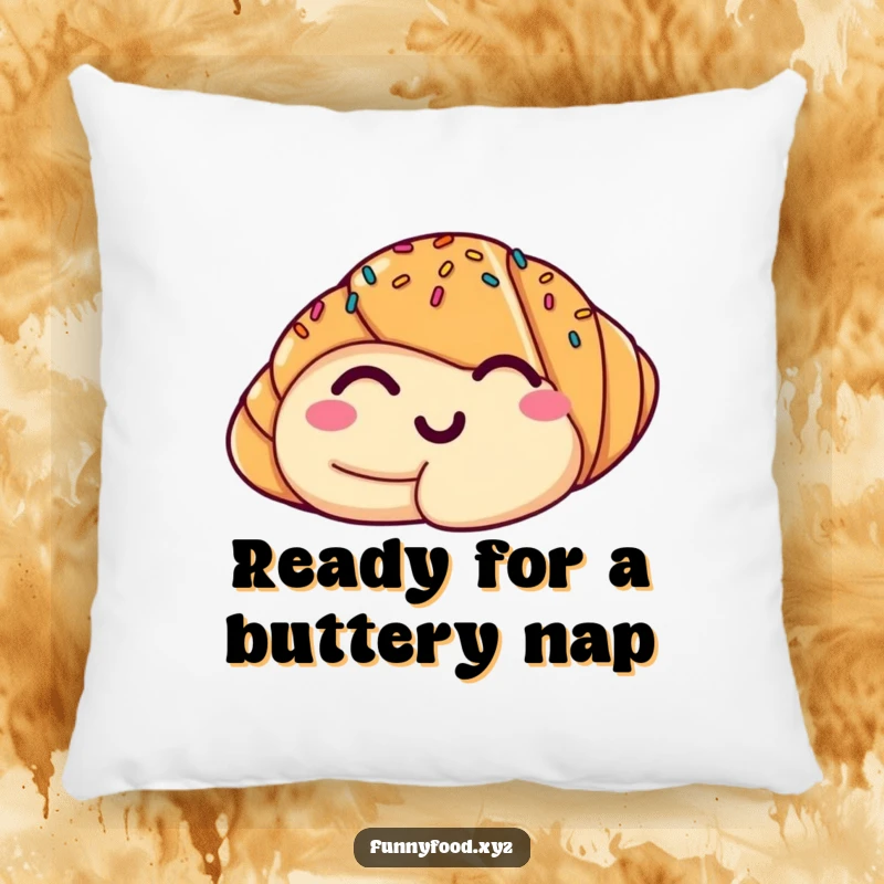 Funny and soft pillow featuring a smiling croissant winking with sprinkles, offering comfort and a touch of humor.