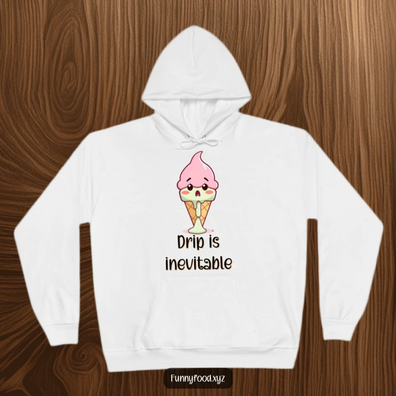 Funny ice cream cone hoodie featuring a startled cone observing a fast-melting drip, perfect for chilly evenings and relatable humor.