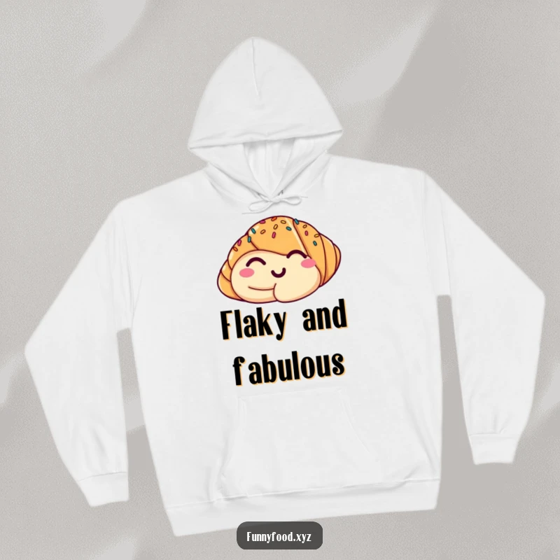 Funny hoodie featuring a cuddly croissant winking with sprinkles, perfect for staying warm and amused.