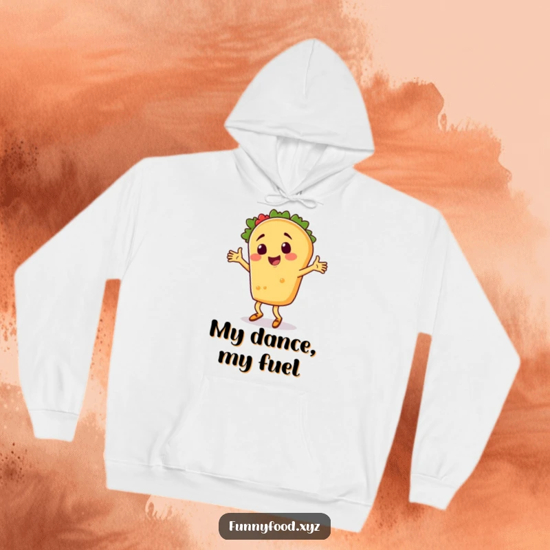A funny taco character captured mid-silly dance, looking joyful on a cozy, warm hoodie.