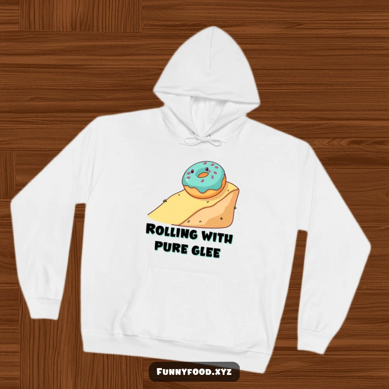 Funny hoodie featuring a gleeful donut joyfully rolling down a hill, perfect for staying warm and amused.